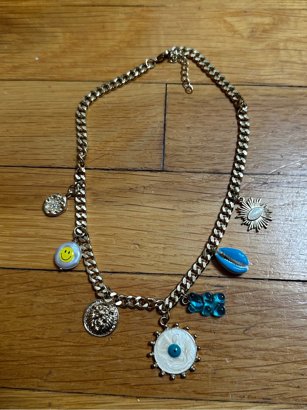 whimsical gold curb chain charm necklace
